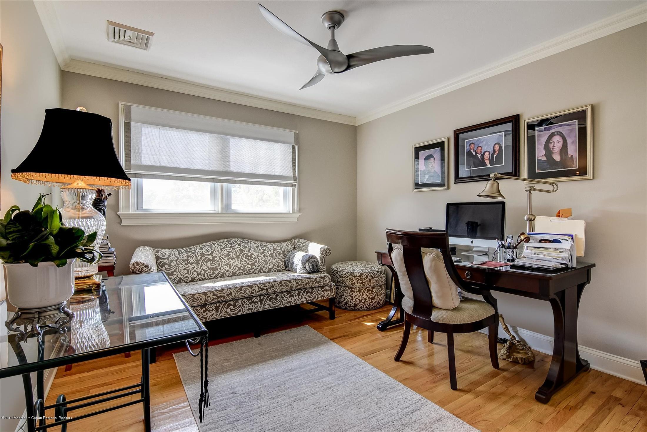 244 Elton Adelphia Road Freehold, NJ 07728 - Photo 22 of 46 a living room with furniture and a flat screen tv