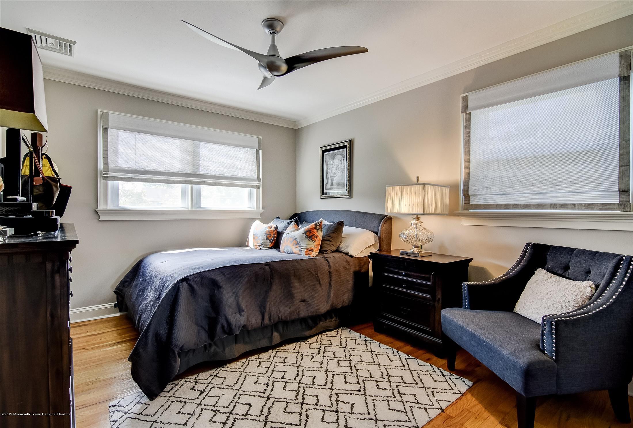 244 Elton Adelphia Road Freehold, NJ 07728 - Photo 23 of 46 a bed room with a bed and a couch