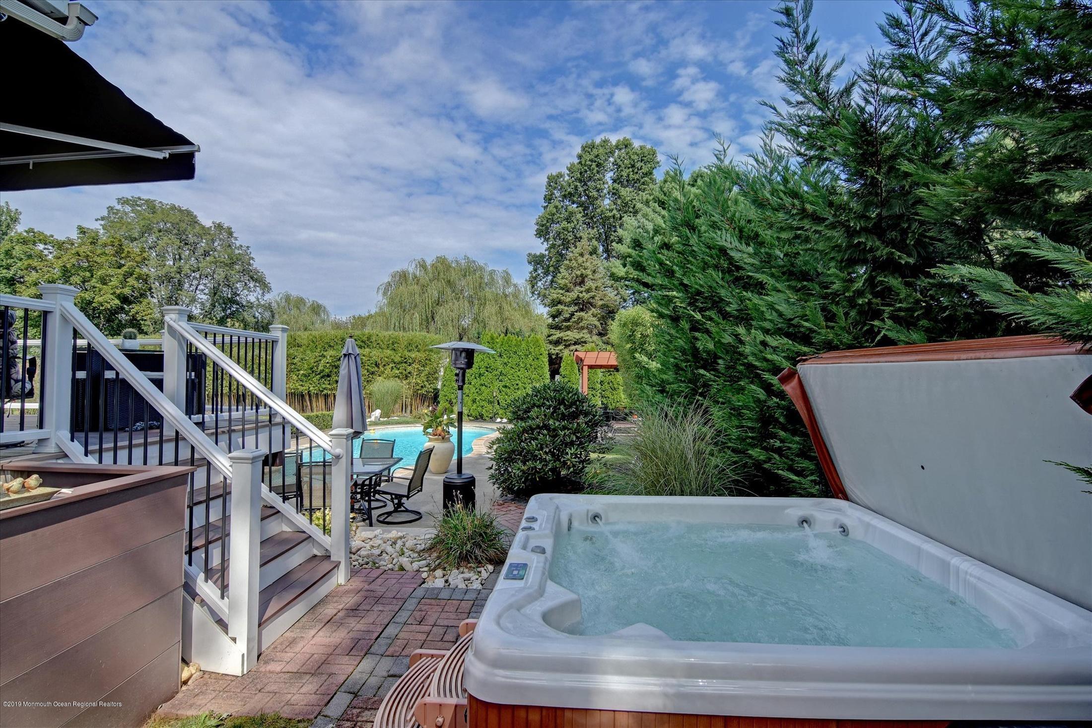244 Elton Adelphia Road Freehold, NJ 07728 - Photo 36 of 46 a view of outdoor space deck and yard