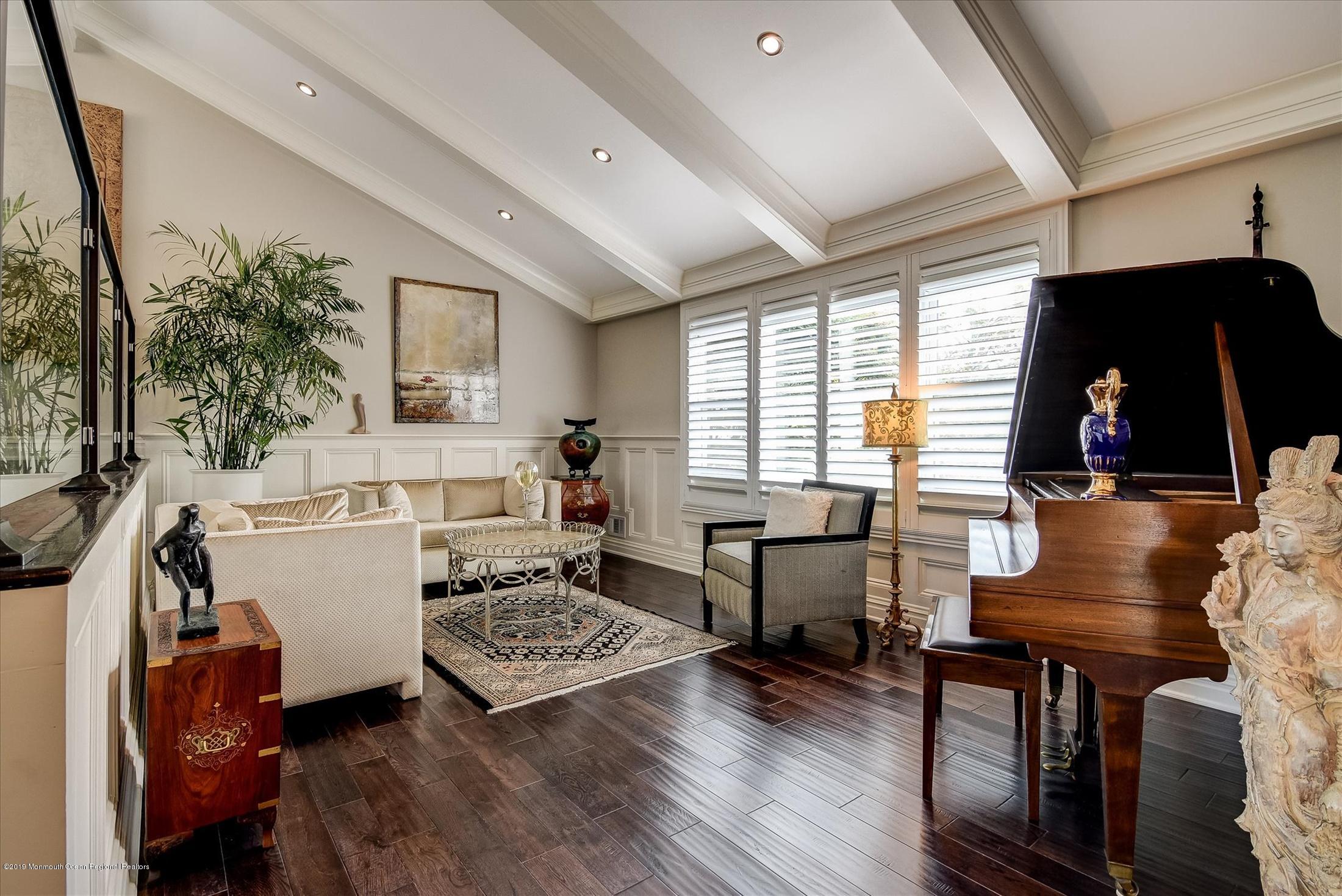 244 Elton Adelphia Road Freehold, NJ 07728 - Photo 6 of 46 a living room with furniture and a window