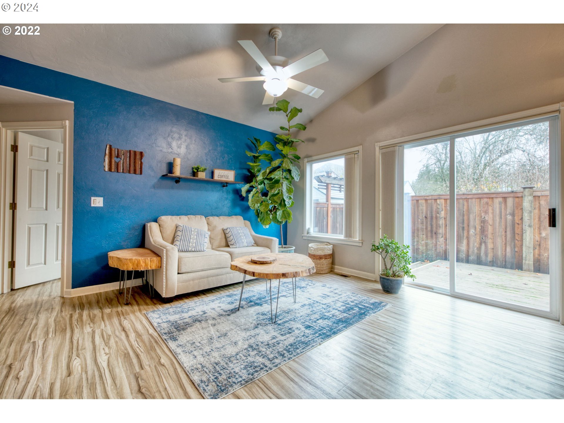 1425 Gilham Road Eugene, OR 97401 - Photo 14 of 30 a living room with furniture and wooden floor