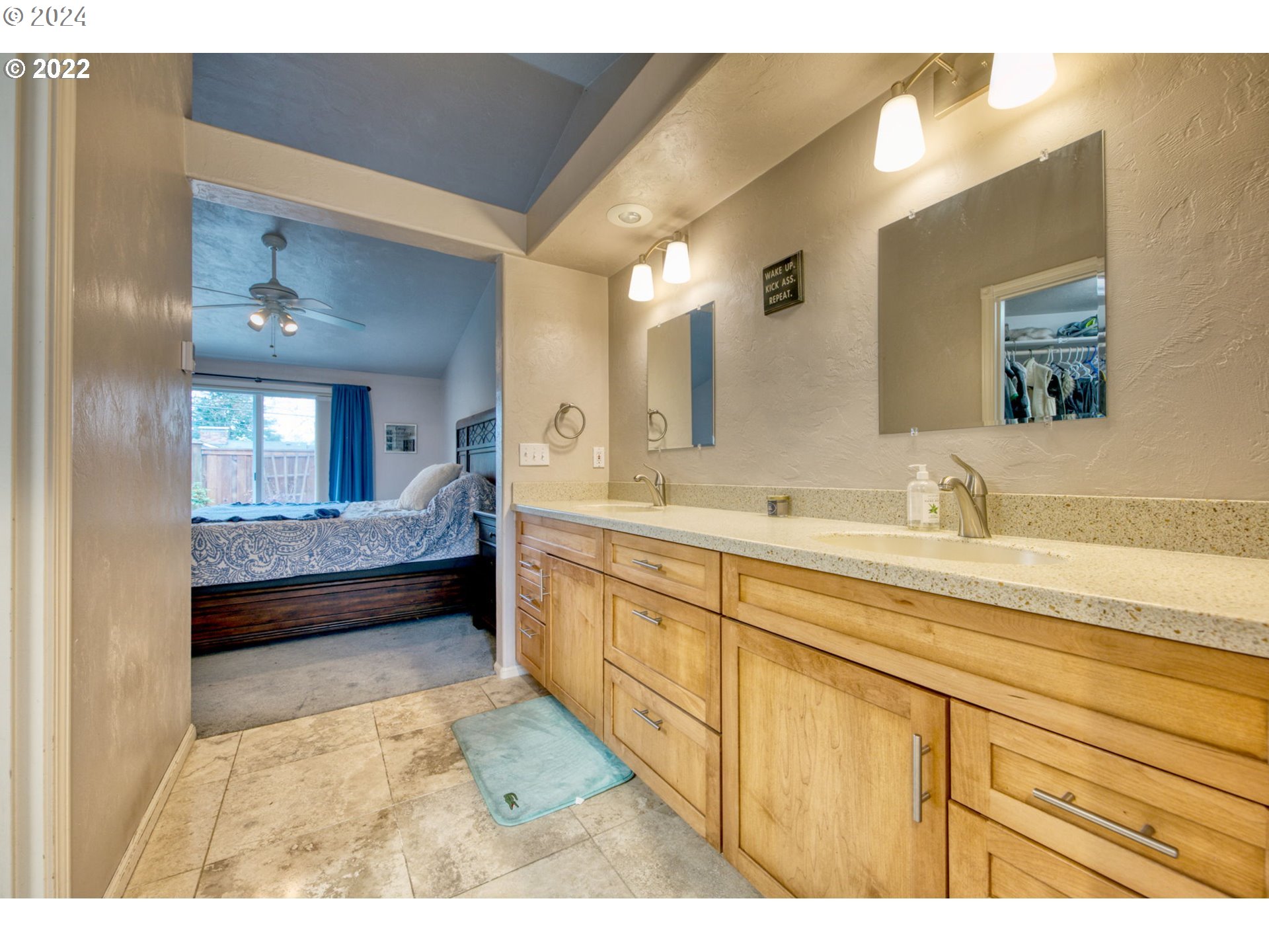 1425 Gilham Road Eugene, OR 97401 - Photo 21 of 30 a spacious bathroom with a sink a mirror and a bathtub