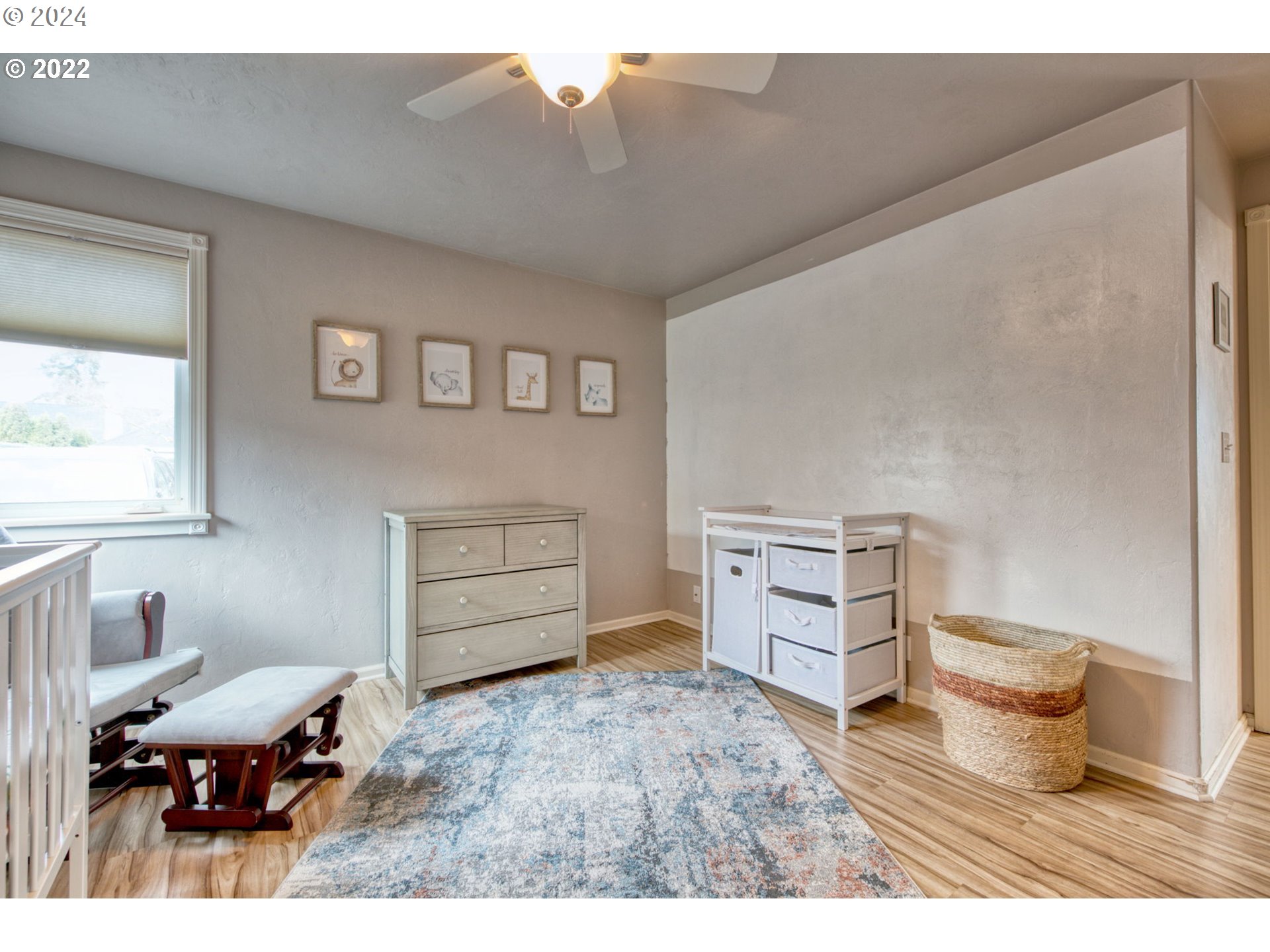 1425 Gilham Road Eugene, OR 97401 - Photo 27 of 30 a living room with furniture and wooden floor