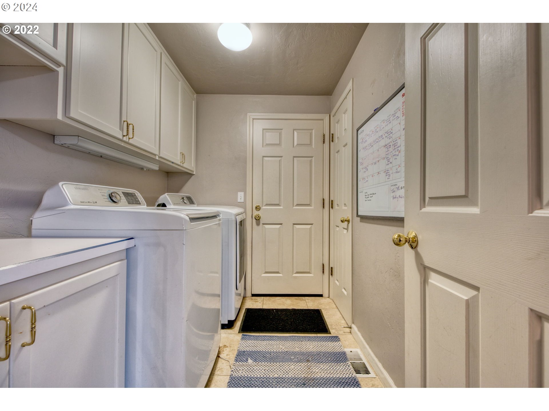 1425 Gilham Road Eugene, OR 97401 - Photo 29 of 30 a utility room with dryer and washer