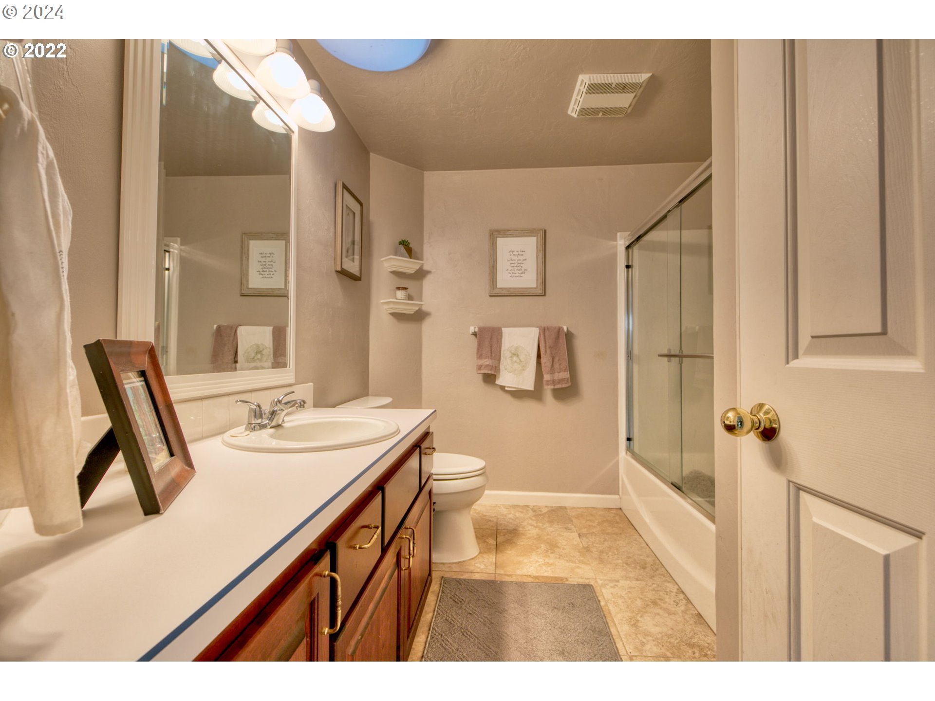 1425 Gilham Road Eugene, OR 97401 - Photo 30 of 30 a bathroom with a sink a toilet and shower