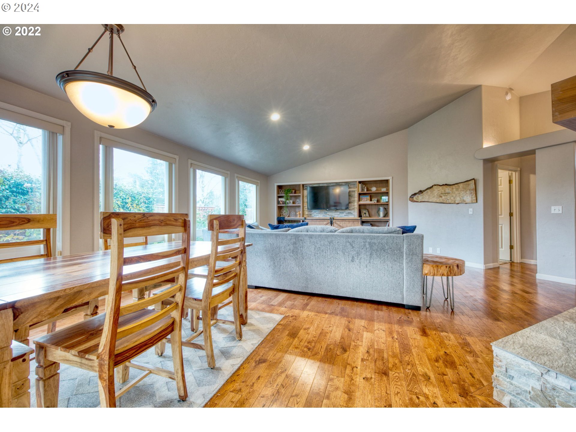1425 Gilham Road Eugene, OR 97401 - Photo 3 of 30 a living room with furniture and a large window