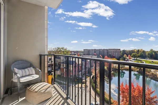 a view of balcony with furniture