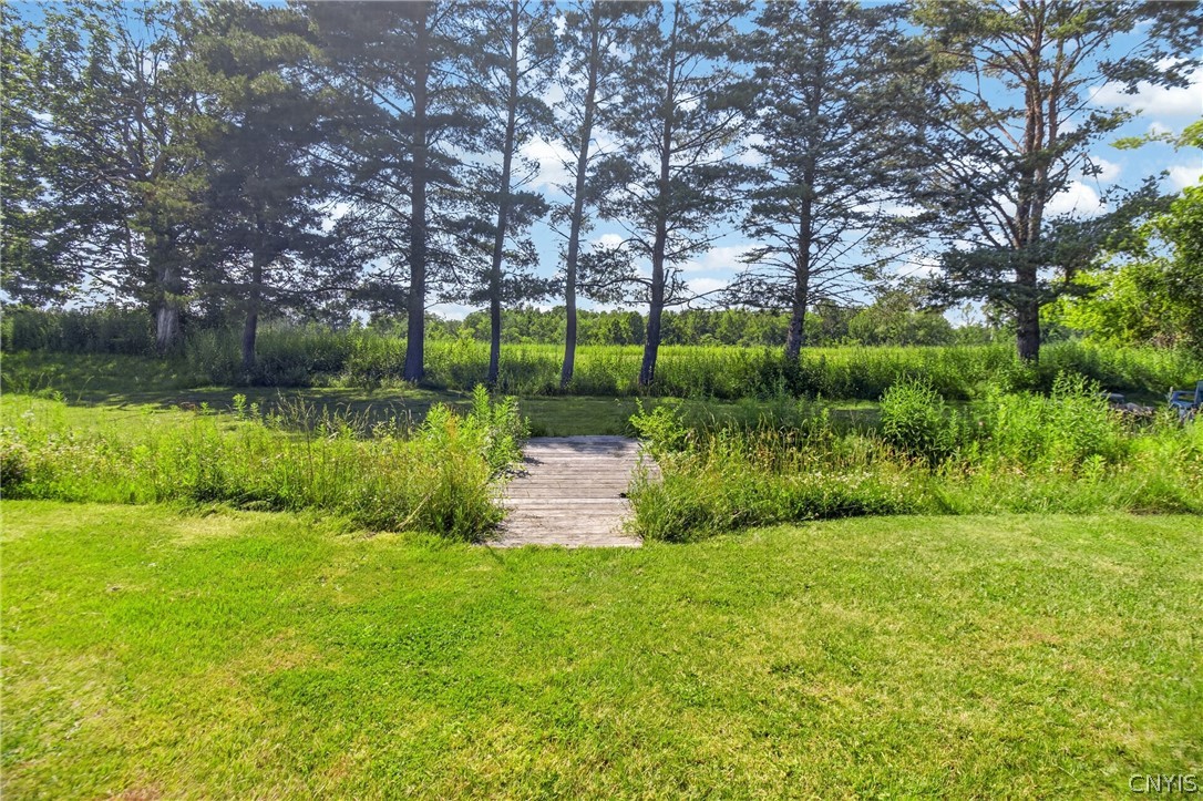 5459 Prescott Road Deerfield, NY 13502 - Photo 11 of 50 small creek running through backyard