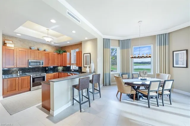 a view of a dining room with furniture window and outside view