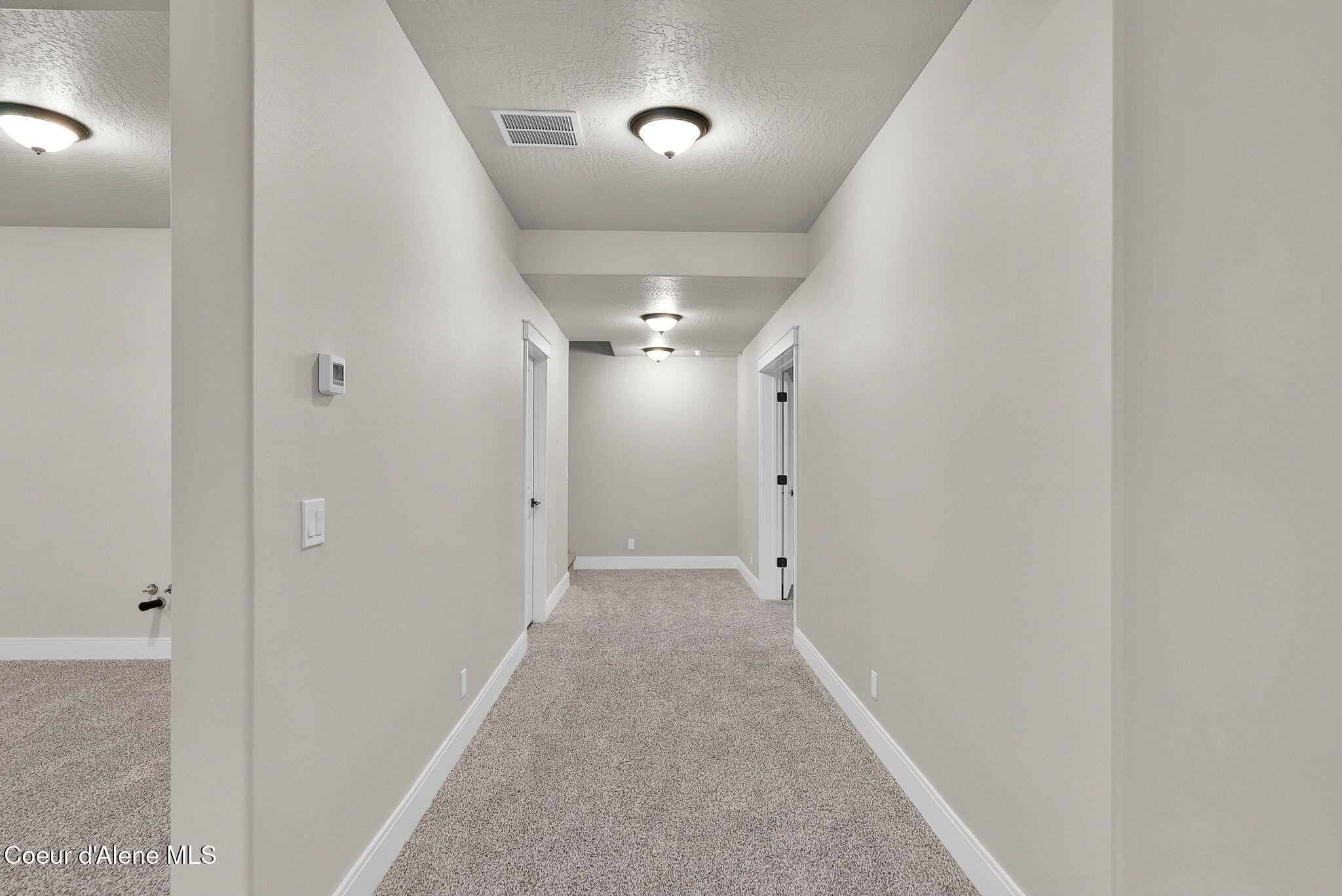 20646 North Bombastic Street Rathdrum, ID 83858 - Photo 34 of 53 Basement Hallway