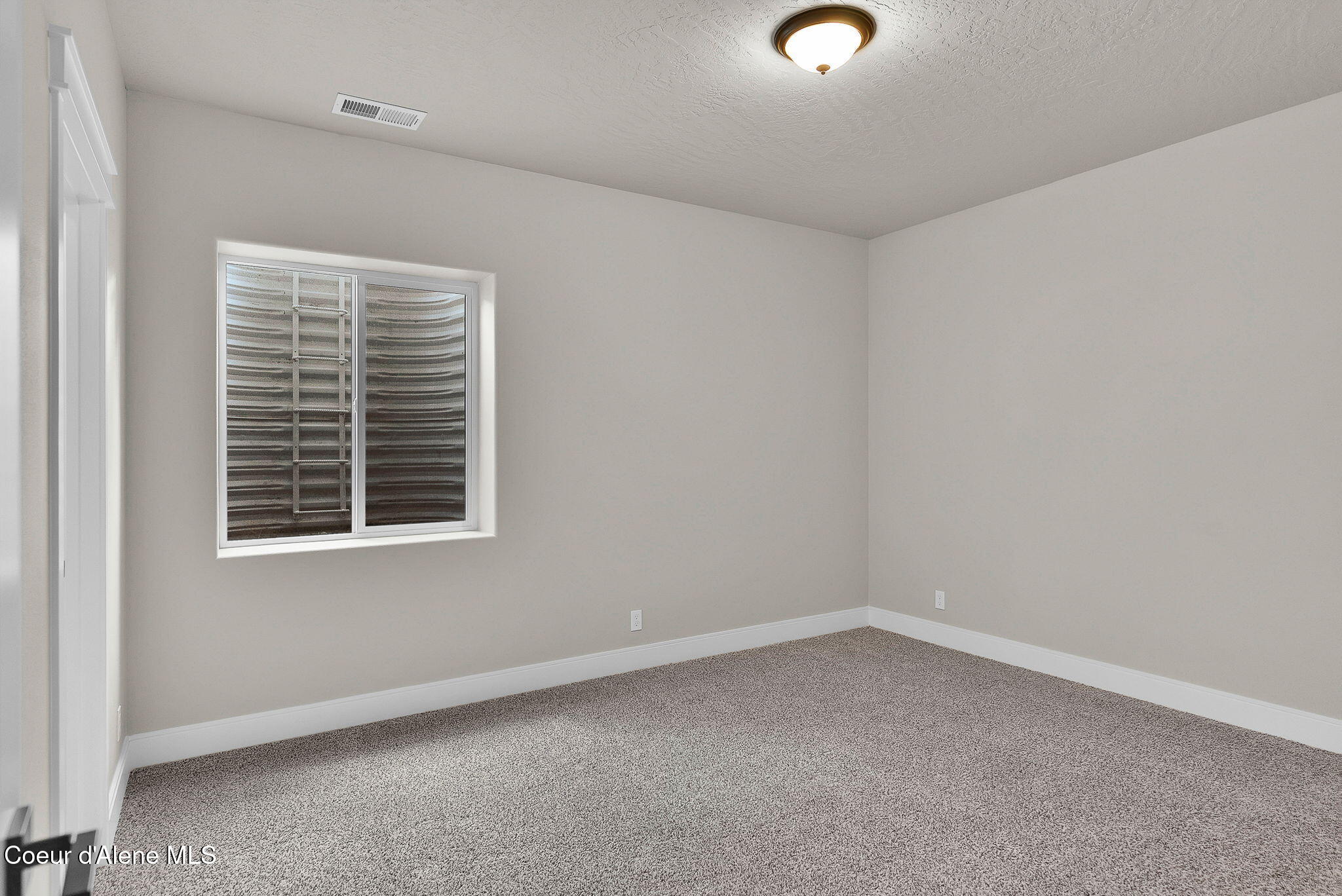 20646 North Bombastic Street Rathdrum, ID 83858 - Photo 46 of 53 Basement Bedroom 2
