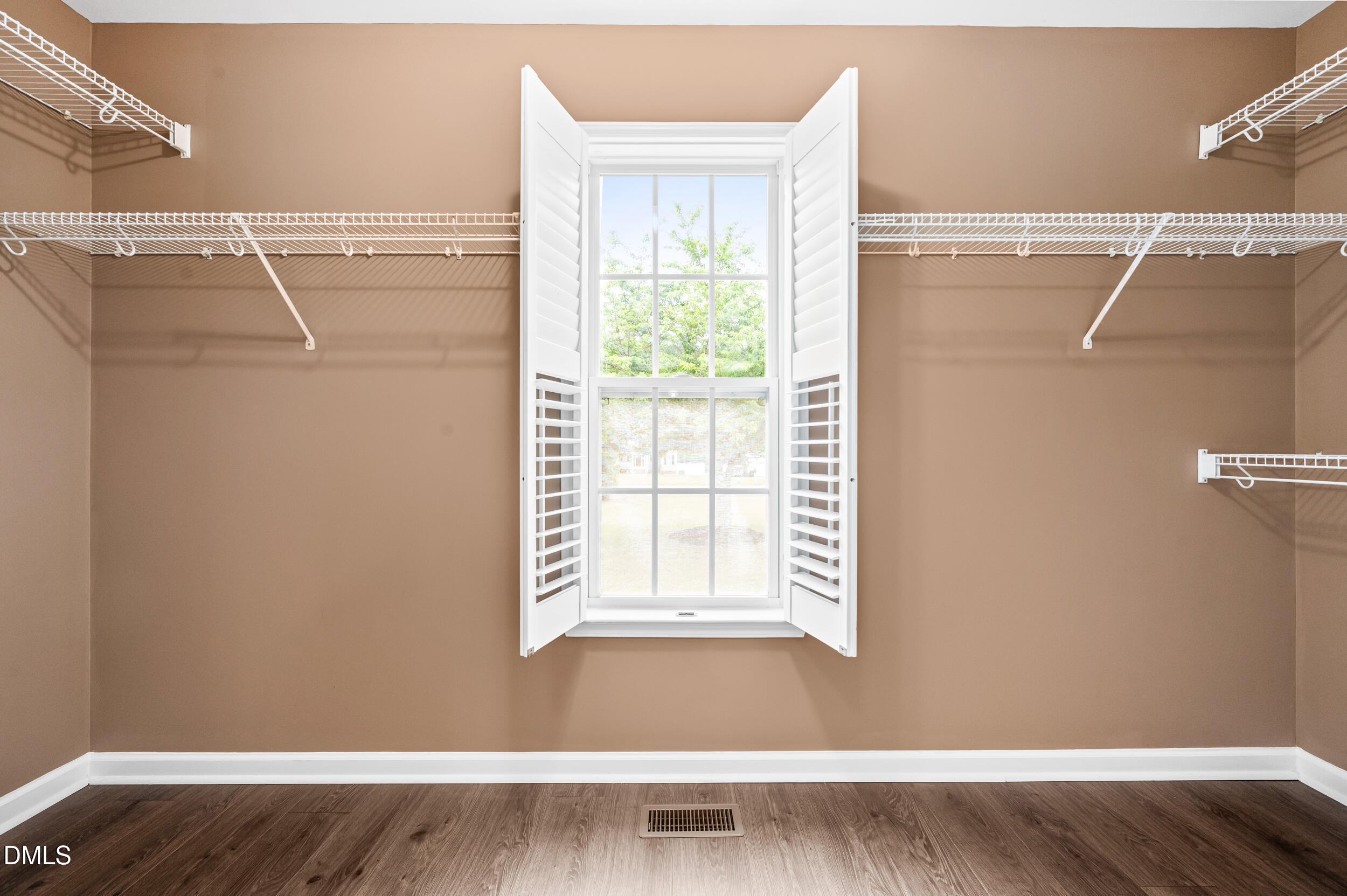 125 Rustic Lane Smithfield, NC 27577 - Photo 26 of 49 a view of a small space with wooden floor and a window