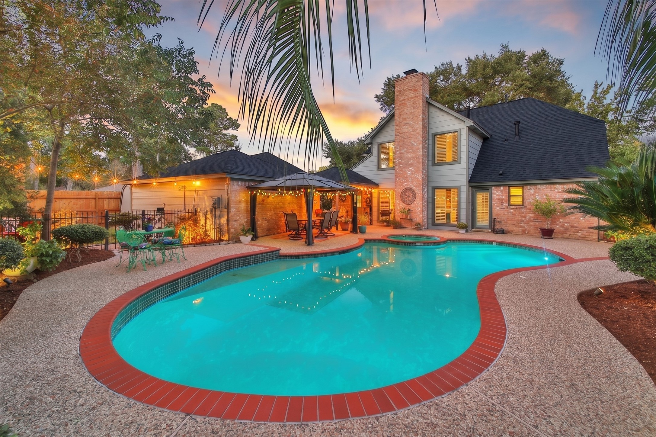 17007 Windrow Drive Spring, TX 77379 - Photo 1 of 46 an aerial view of a house with swimming pool and patio
