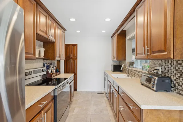 a bathroom with a double vanity sink mirror and double