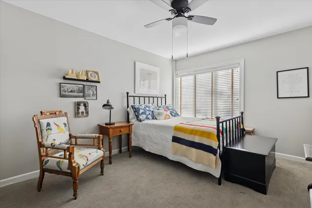 a bedroom with a bed furniture and a window