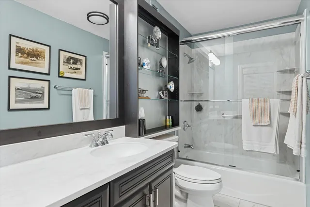 a bathroom with a washer and dryer