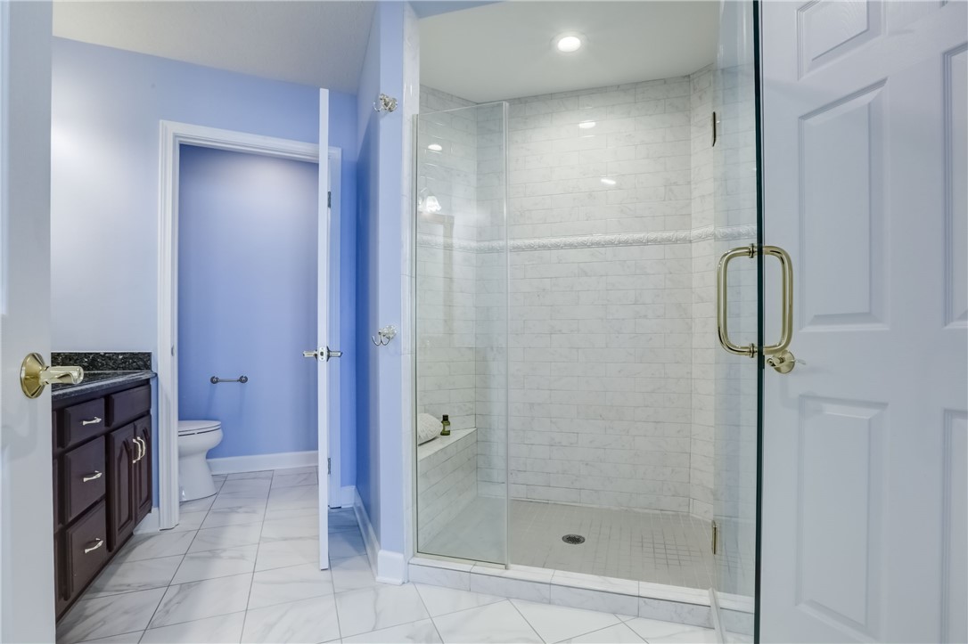 3243 Abbey Road Buffalo, NY 14224 - Photo 22 of 36 This view of the main suite bathroom displays the