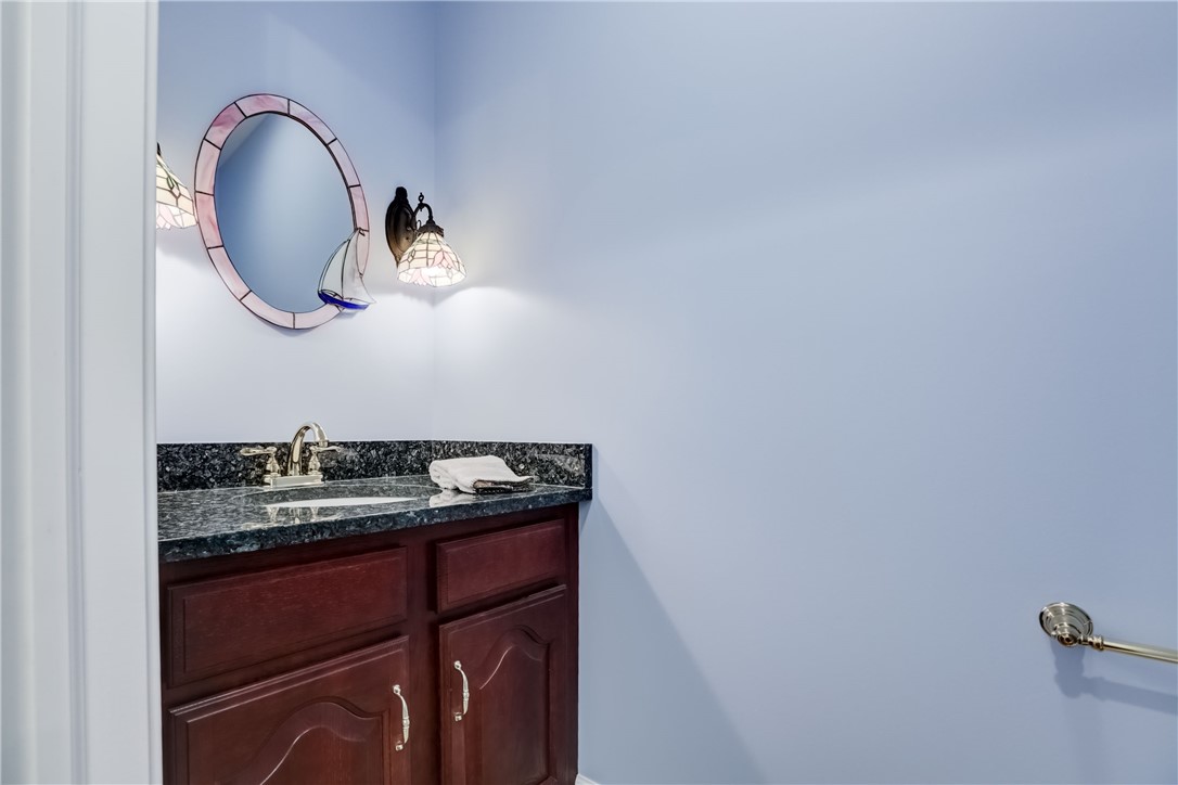 3243 Abbey Road Buffalo, NY 14224 - Photo 26 of 36 First floor powder room located off hallway near l