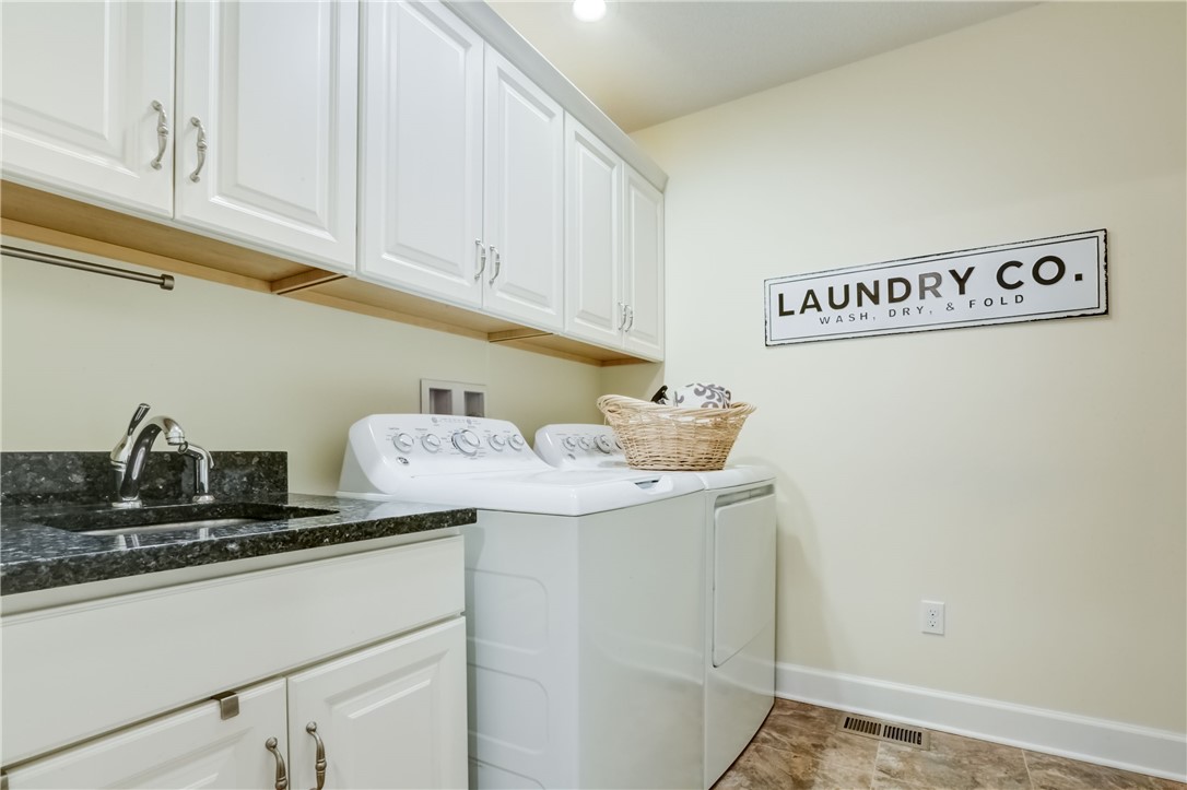 3243 Abbey Road Buffalo, NY 14224 - Photo 27 of 36 Generously sized 1st floor laundry with washer and