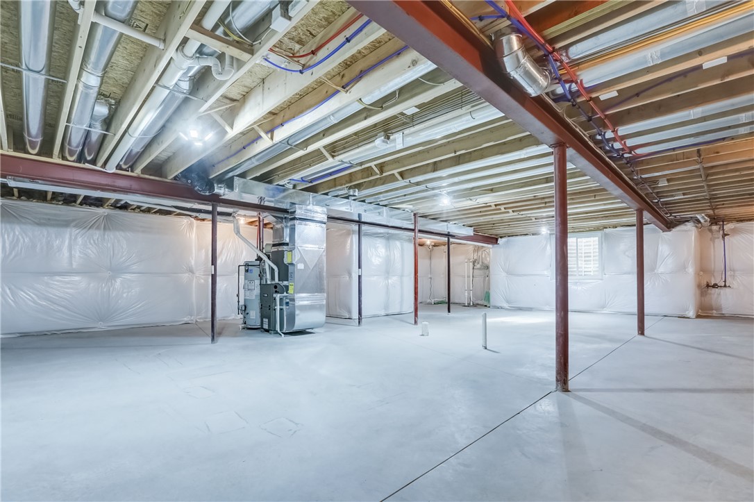 3243 Abbey Road Buffalo, NY 14224 - Photo 32 of 36 Expansive basement, ready to be finished, with an