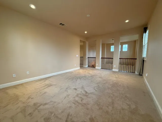 a view of a livingroom with a staircase