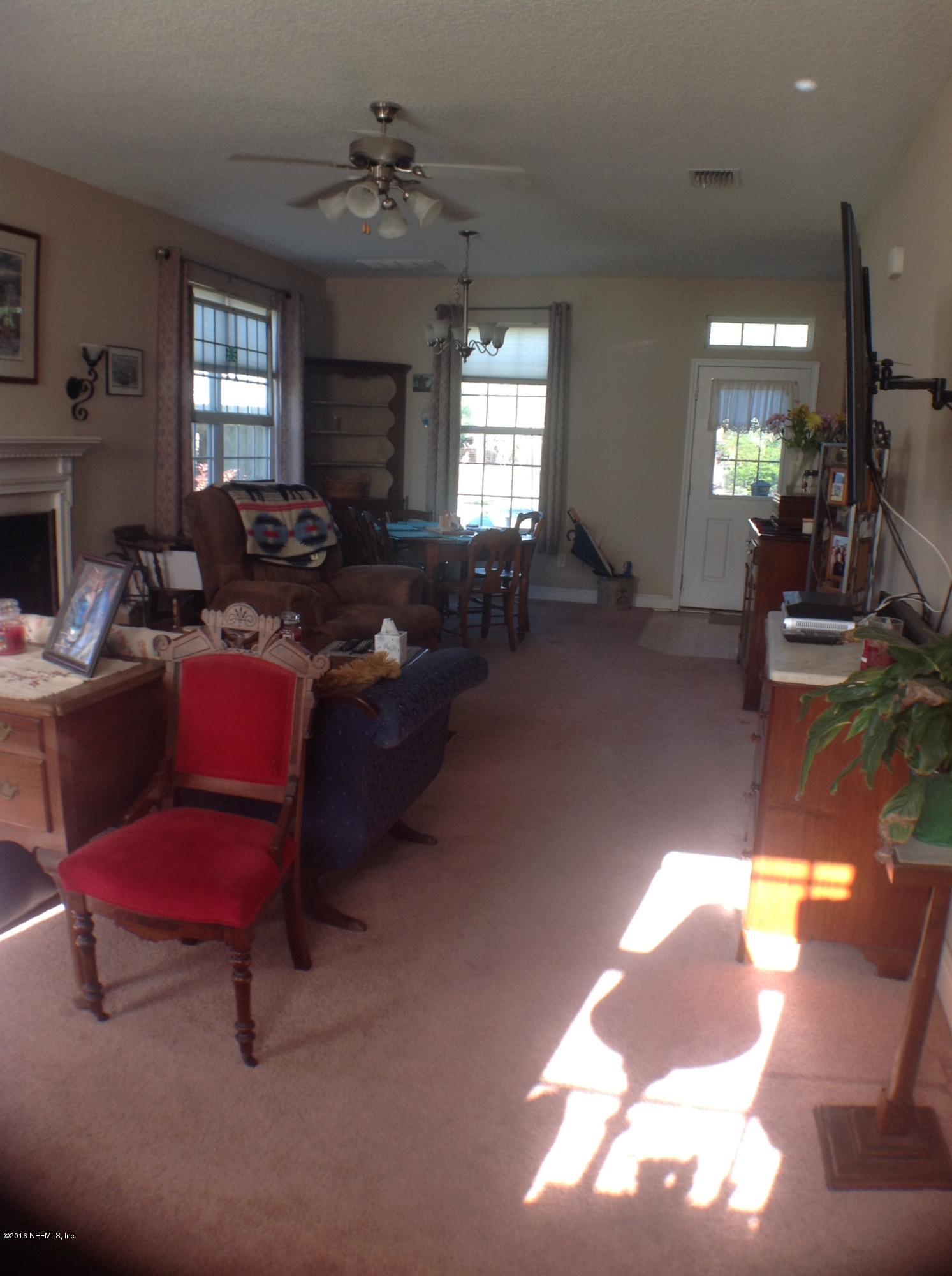 2366 Tyrone Road Middleburg, FL 32068 - Photo 8 of 21 Family Room to Dining Room (2)