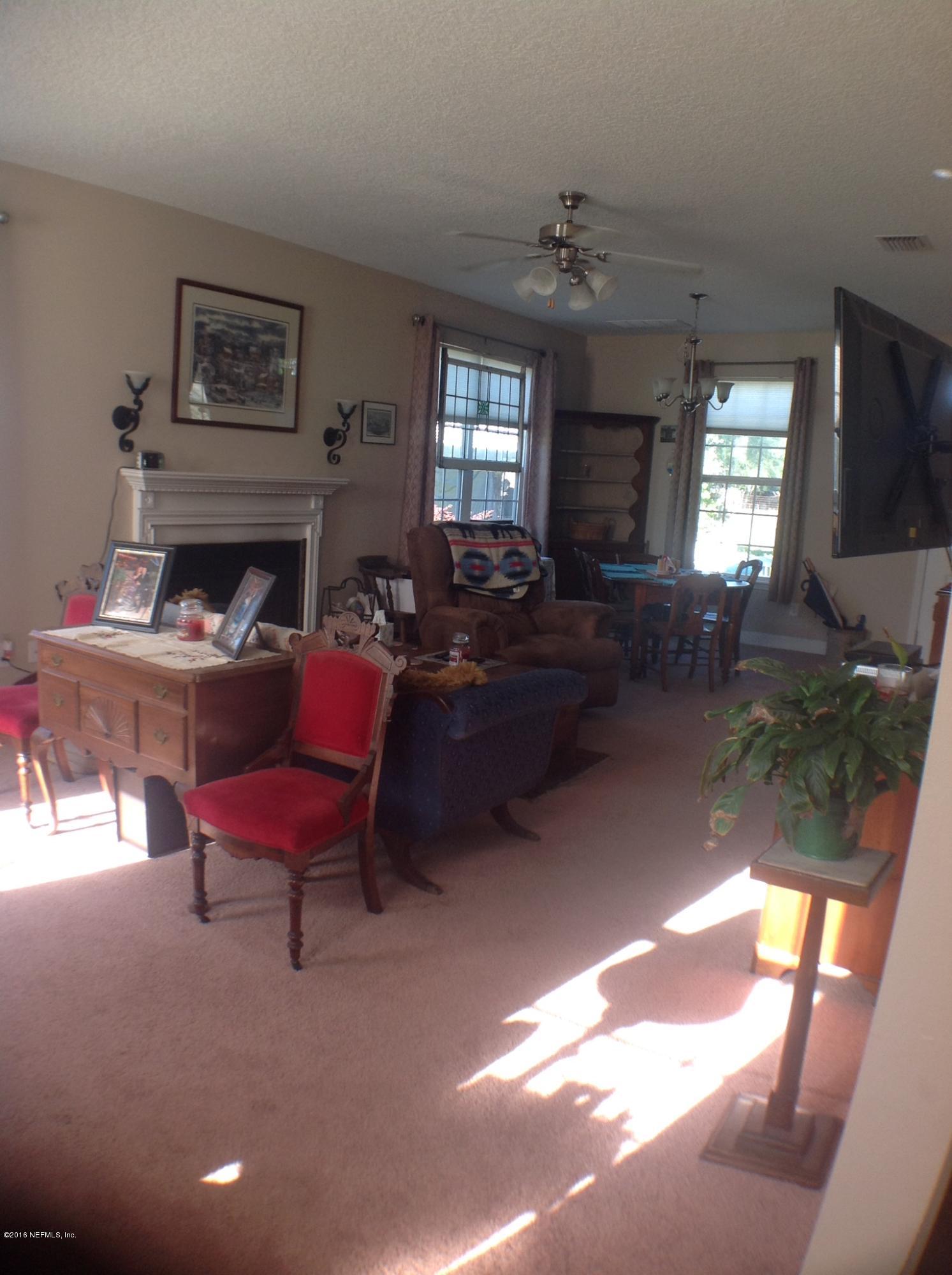 2366 Tyrone Road Middleburg, FL 32068 - Photo 9 of 21 Family Room to Dining Room