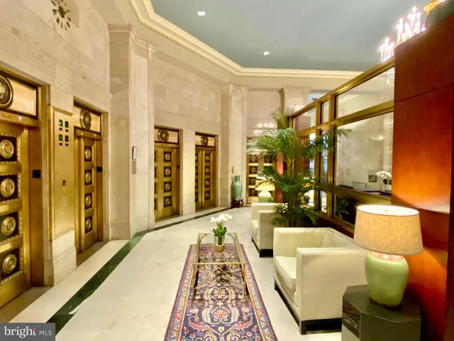 a bed room with a bed and glass door