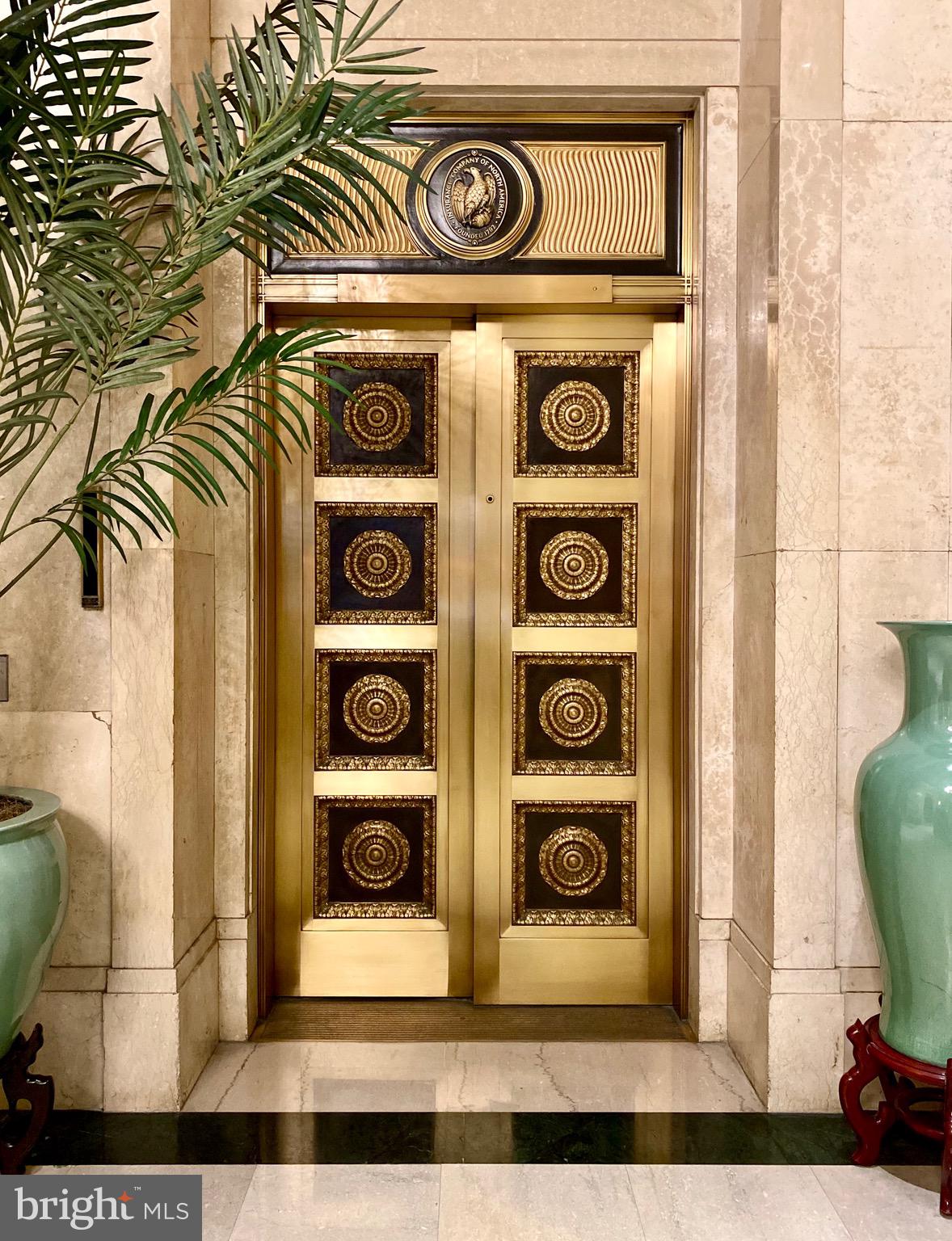1600-18 Arch Street, Unit 803 Philadelphia, PA 19103 - Photo 19 of 34 a view of front door with a door and a window
