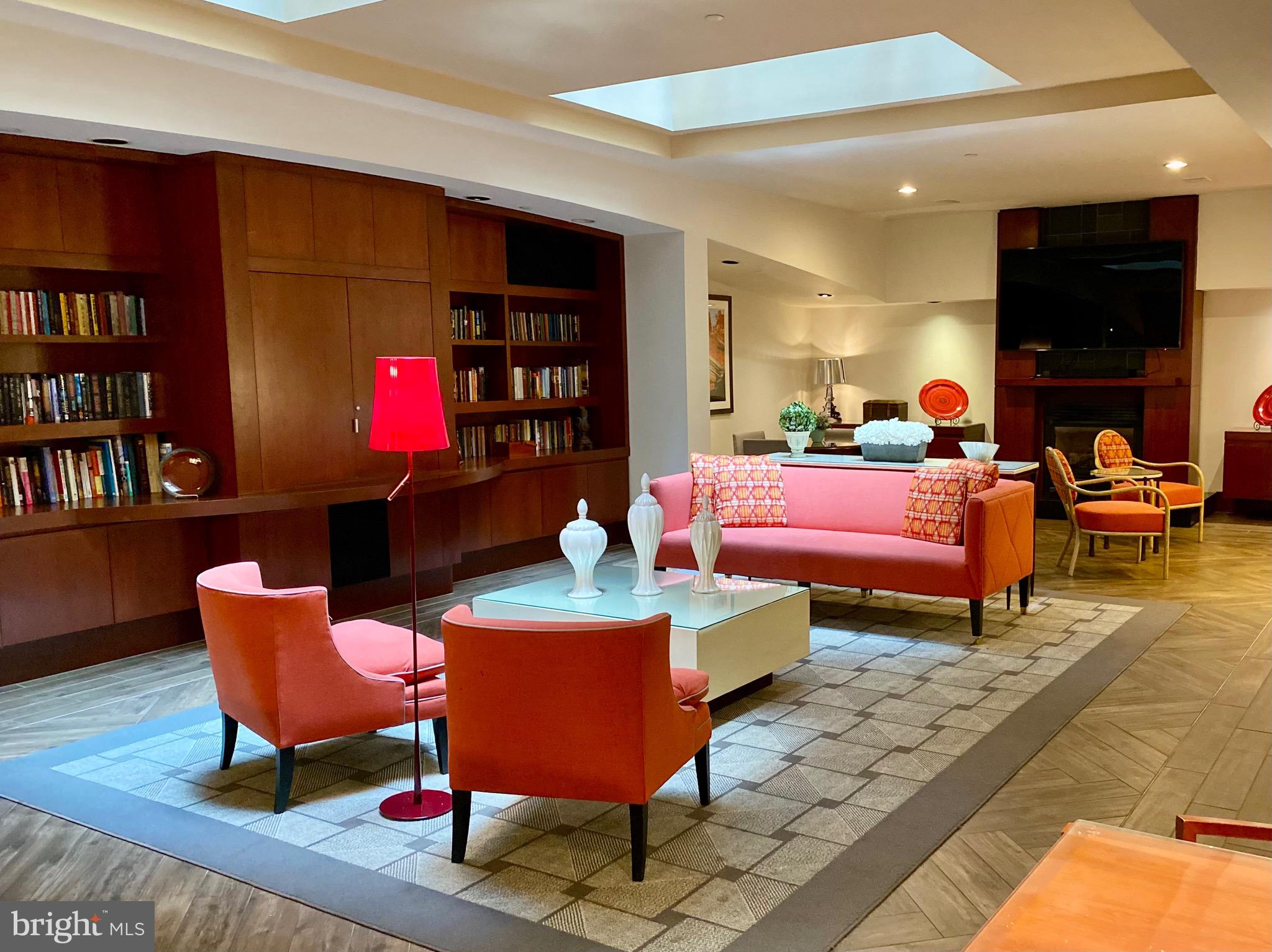 1600-18 Arch Street, Unit 803 Philadelphia, PA 19103 - Photo 28 of 34 a bedroom with furniture and a book shelf