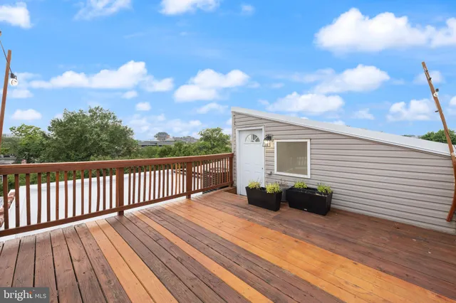 a bedroom with a bed and a lamp