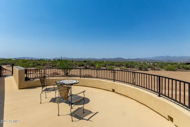 a view of lake view with mountain in the background