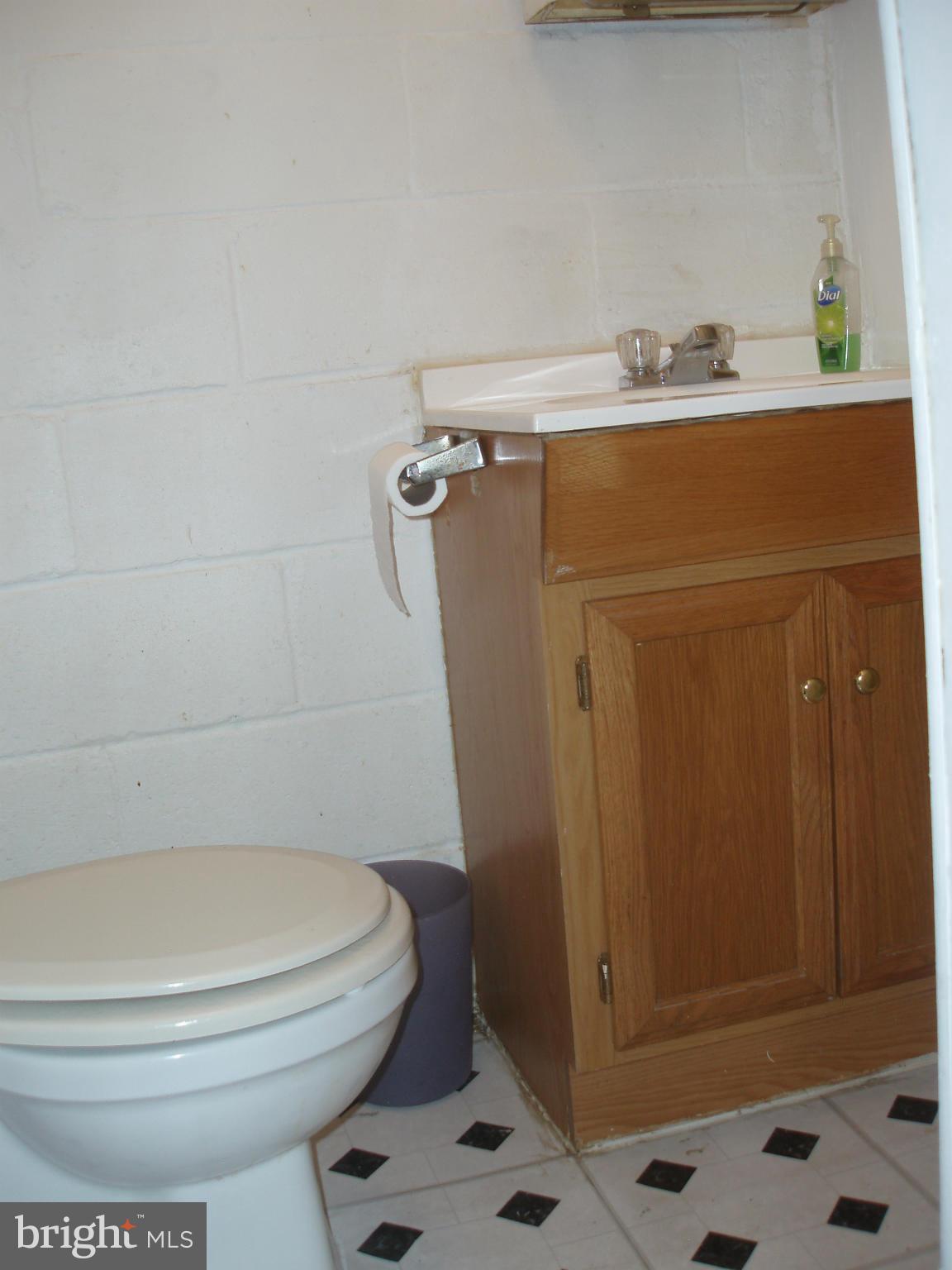 1417 Barrett Road Baltimore, MD 21207 - Photo 18 of 18 a bathroom with a toilet and a shower