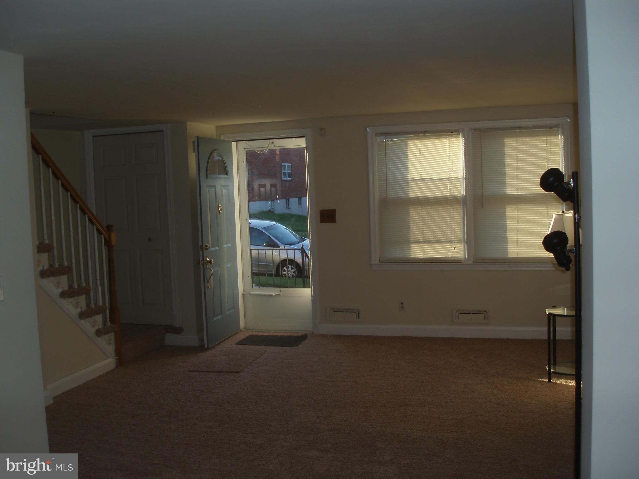 1417 Barrett Road Baltimore, MD 21207 - Photo 3 of 18 a view of empty room with windows