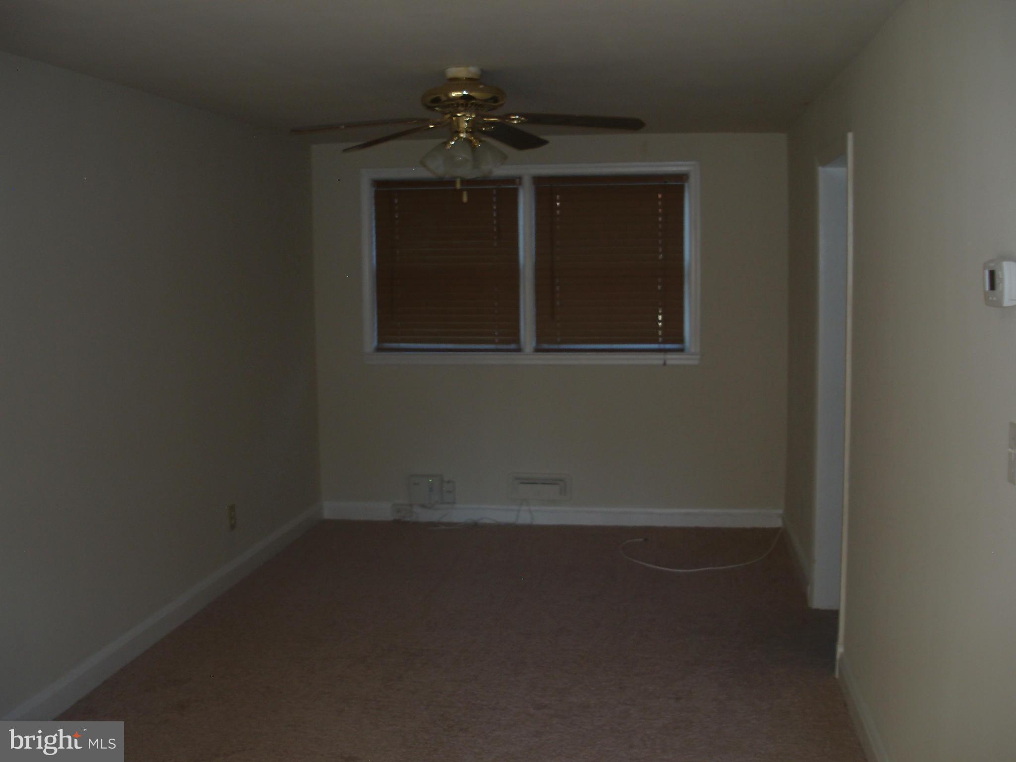1417 Barrett Road Baltimore, MD 21207 - Photo 4 of 18 a view of a livingroom with a fan