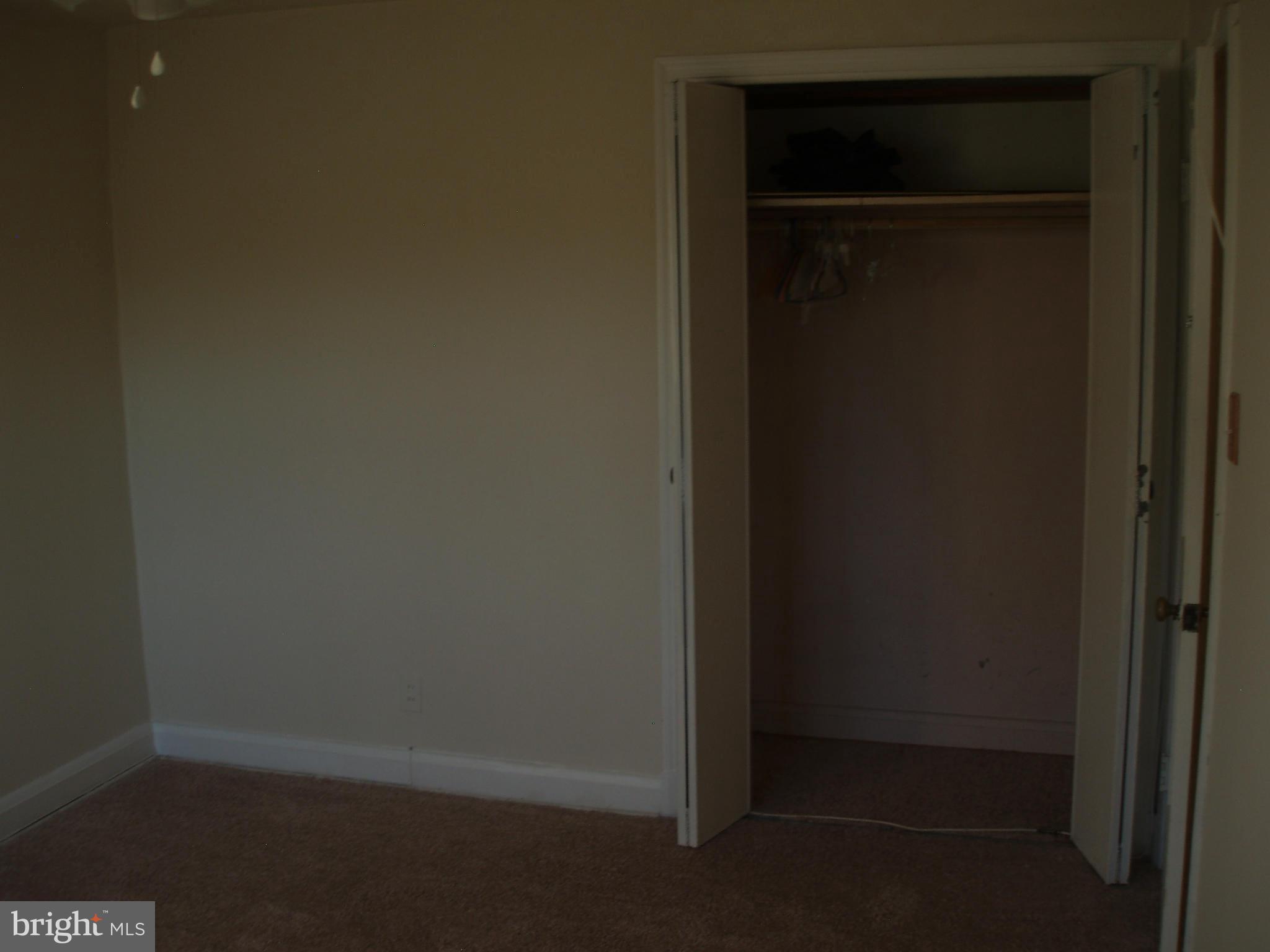 1417 Barrett Road Baltimore, MD 21207 - Photo 8 of 18 a empty room with a empty space