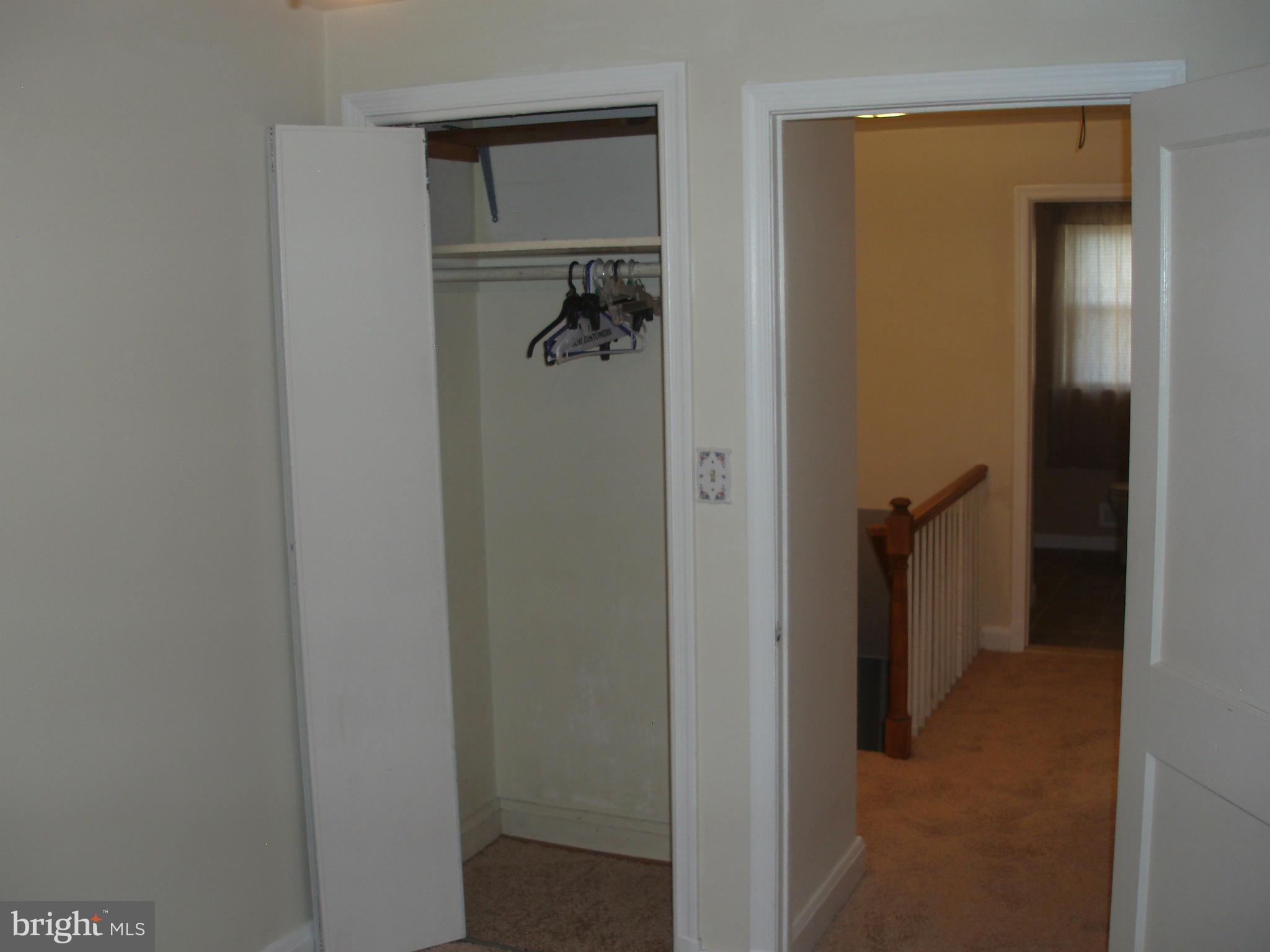 1417 Barrett Road Baltimore, MD 21207 - Photo 10 of 18 a view of a bathroom from a hallway