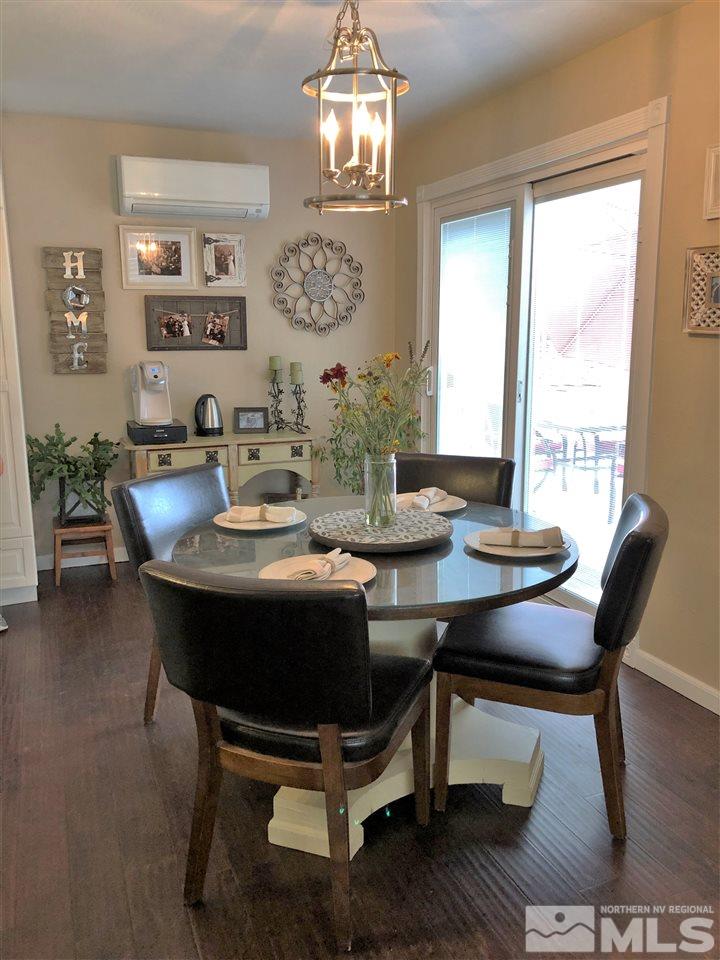 1785 Ada's Street Reno, NV 89509 - Photo 5 of 19 a view of a dining room with furniture window and wooden floor