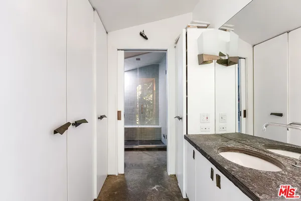 a bathroom with a shower and a toilet