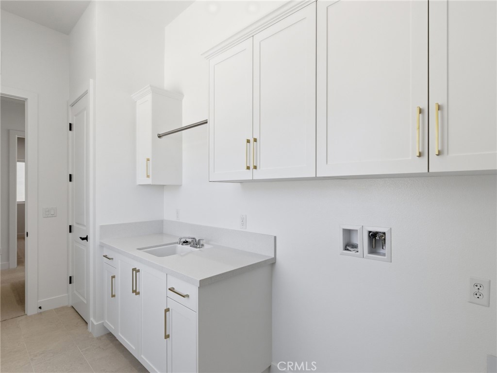 11850 Red Hawk Lane Porter Ranch, CA 91326 - Photo 47 of 51 Laundry Room: Fernwood Italianate - The Ridge Collection at Bella Vista - Homesite 68