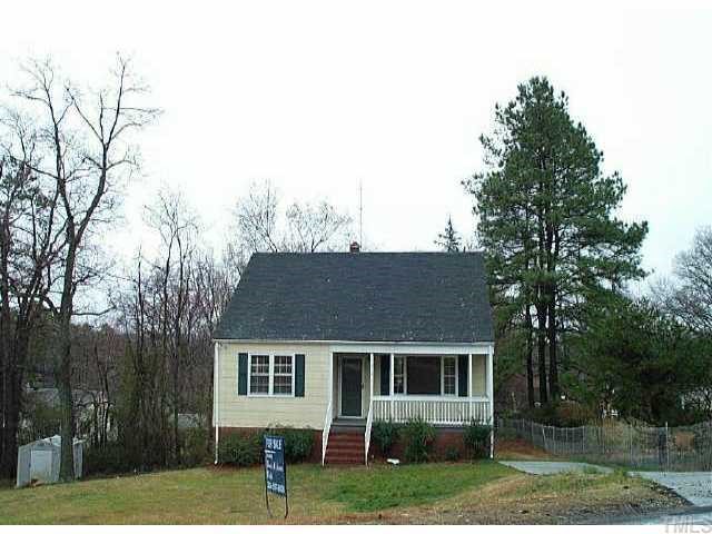 210 10th Avenue Roxboro, NC 27573 - Photo 1 of 1 front view of house with a yard