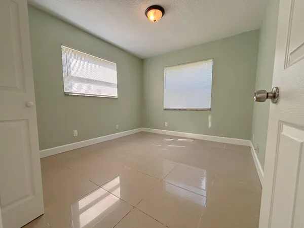 a view of a room with a window