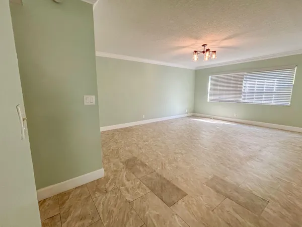 en empty room with windows