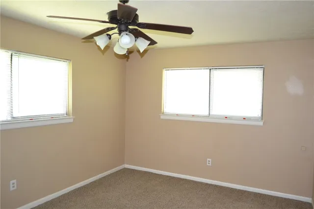 a view of a backyard with a garden