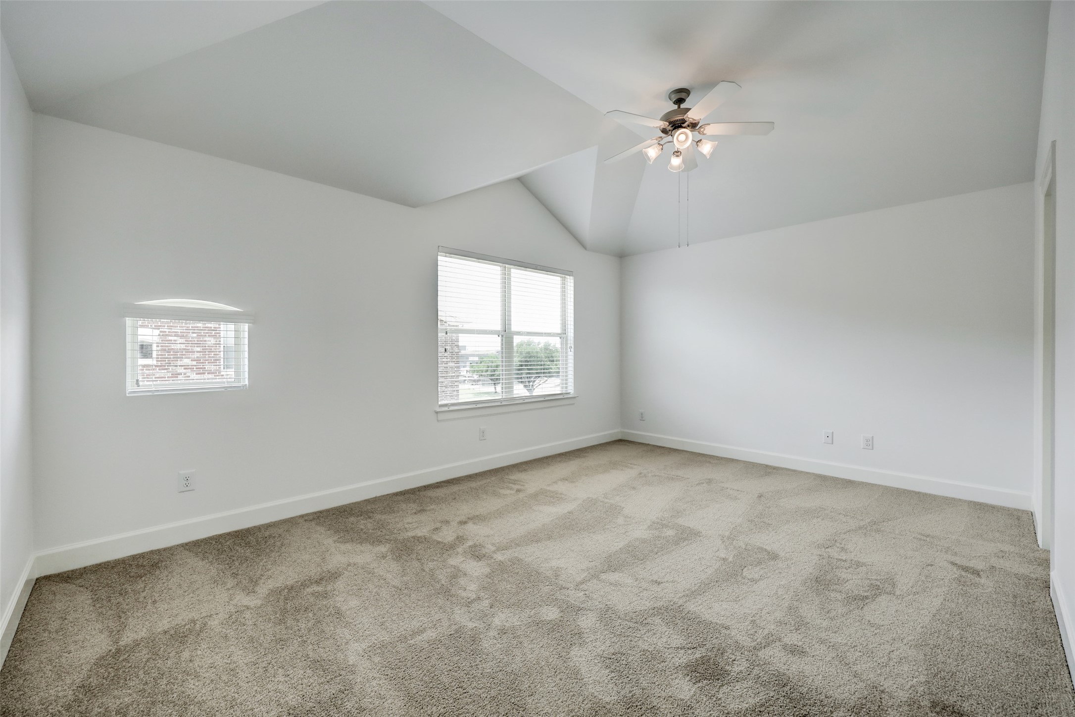5941 South Loop E Freeway, Unit 1002 Houston, TX 77033 - Photo 12 of 16 wooden floor in an empty room with a window