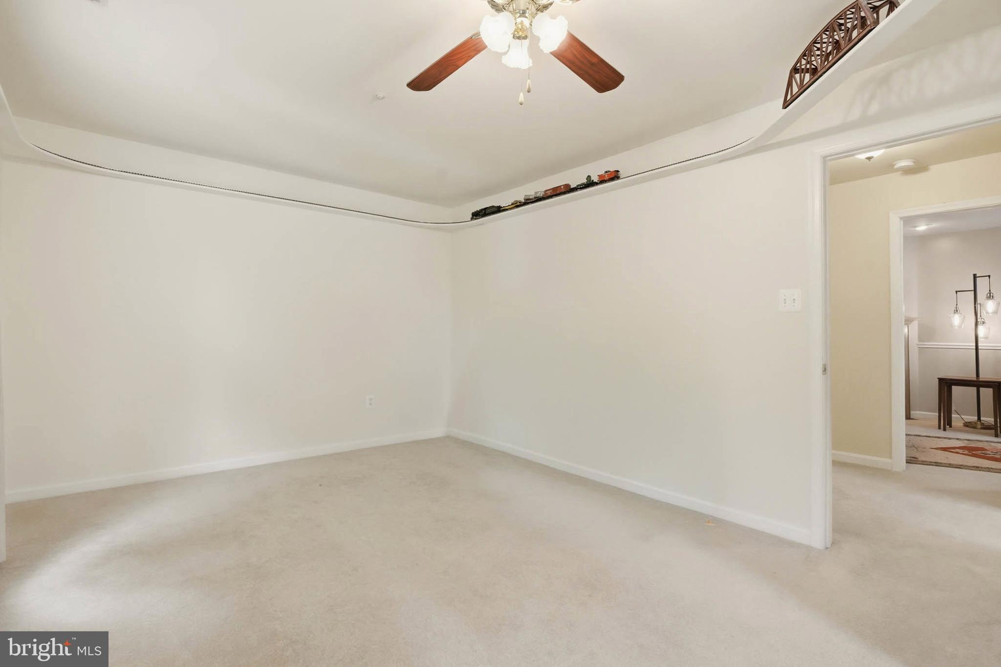 8721 Spring Brook Way Odenton, MD 21113 - Photo 15 of 40 wooden floor in an empty room