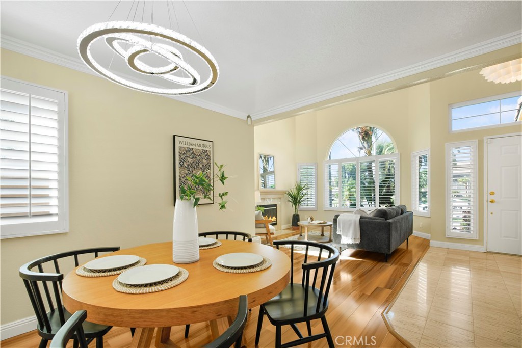 22705 Robin Way Grand Terrace, CA 92313 - Photo 4 of 15 a view of a dining room with furniture window and outside view