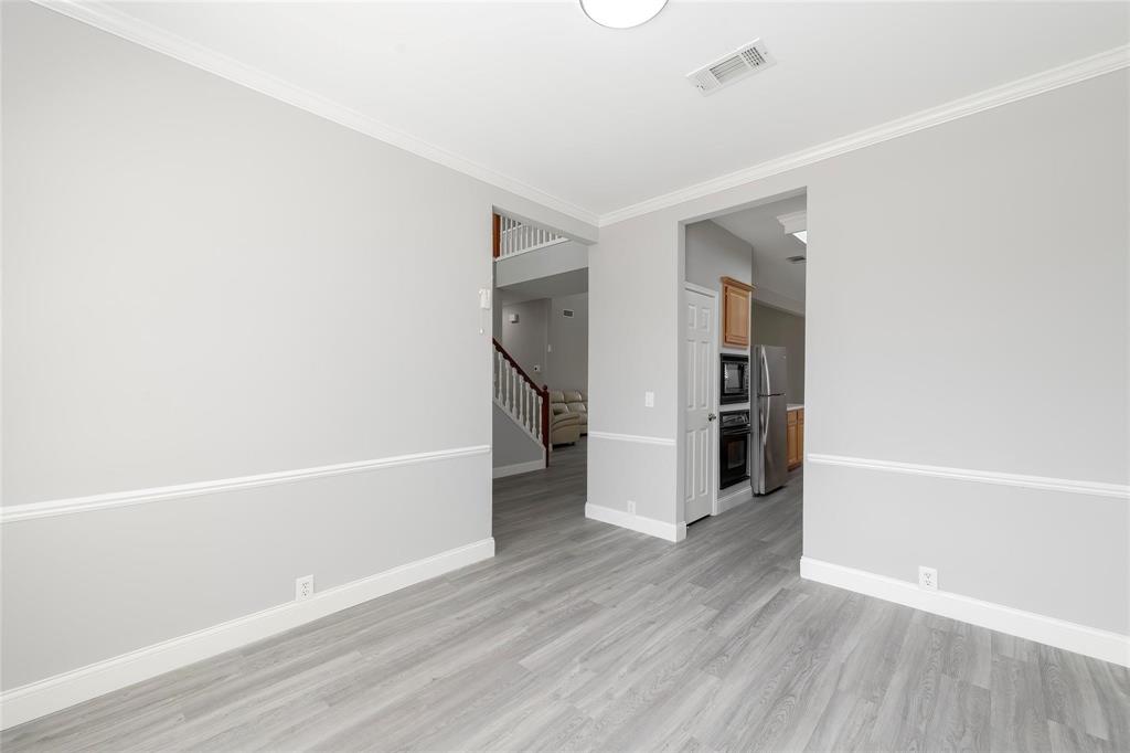 2313 Hunters Run Drive Plano, TX 75025 - Photo 17 of 36 a view of empty room with wooden floor