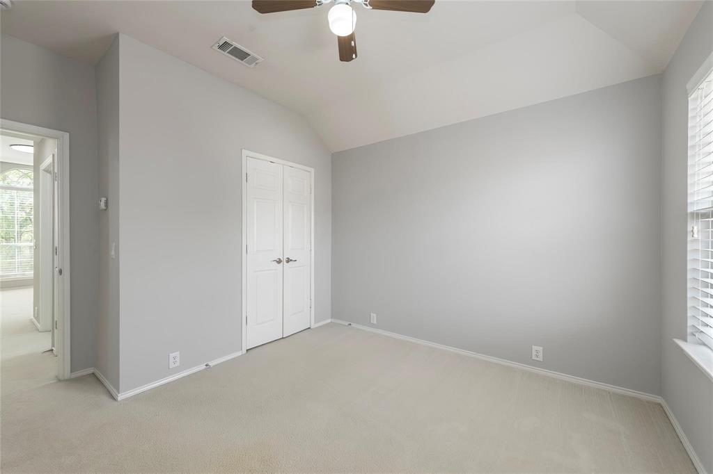 2313 Hunters Run Drive Plano, TX 75025 - Photo 31 of 36 an empty room with a empty space and windows