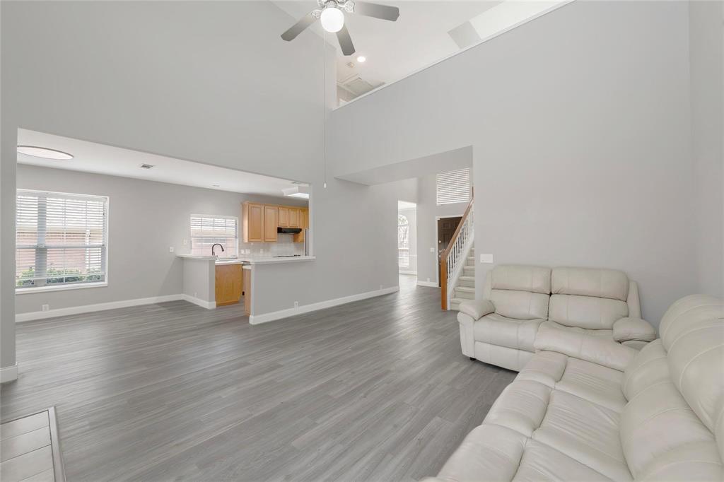 2313 Hunters Run Drive Plano, TX 75025 - Photo 9 of 36 a view of empty room with wooden floor